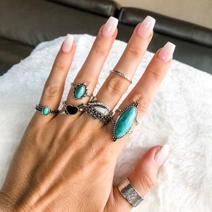 Ring set by Naya May Design. 8 piece.